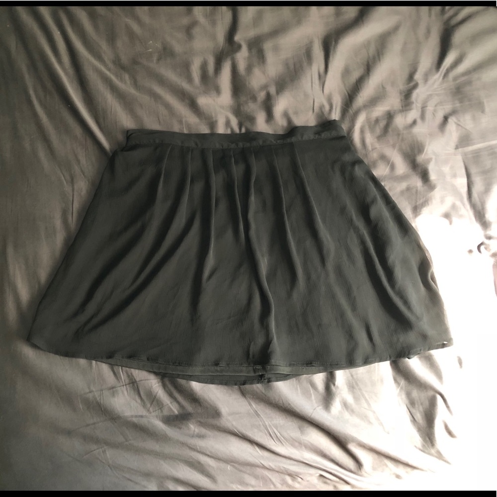 black pleated skirt